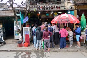 Shop-front-of-banh-mi-restaurant-with-queues