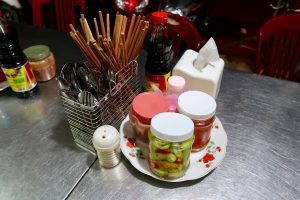 Chopsticks-and-sauces-on-a-table